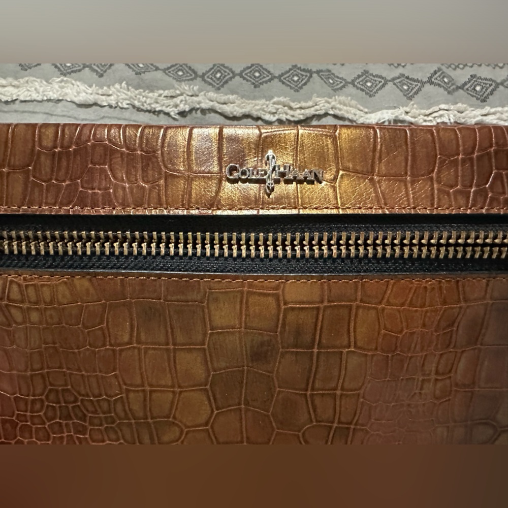Brown leather Cole Haan Clutch bag.